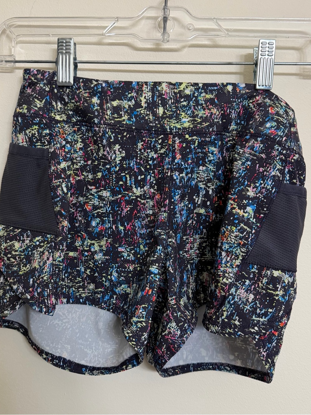 Athleta Black Shorts with Multicolor Paint-Splatter Print